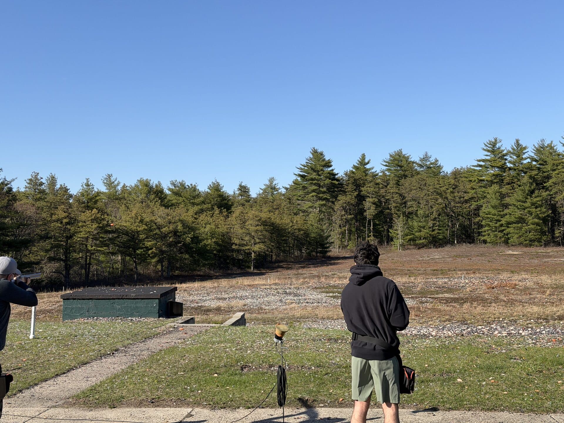 Trap shooter · clay in air